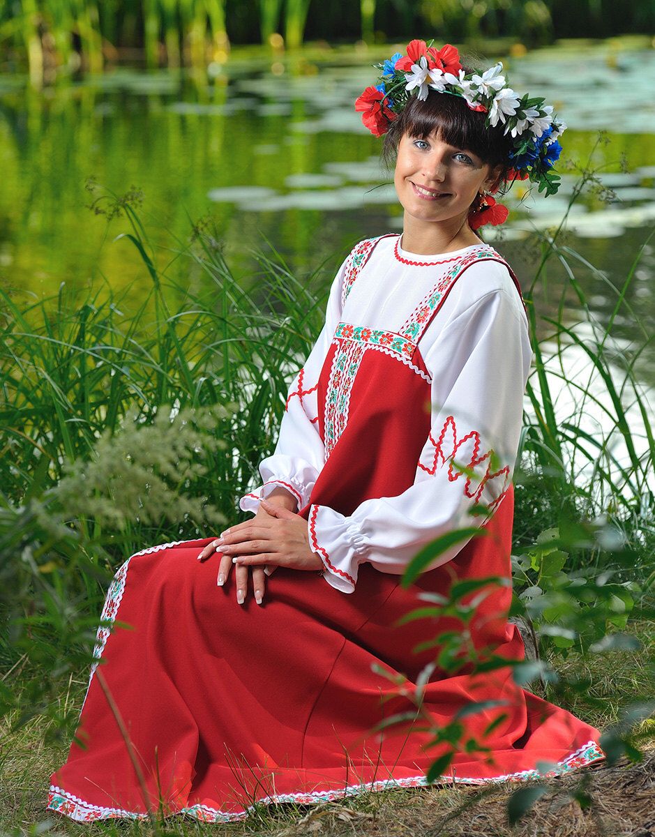 Beautiful girl Girls in Slavic costumes in Cota